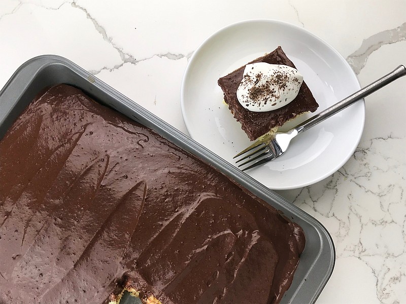 Pudding Poke Cake made with yellow cake and chocolate fudge pudding. (Arkansas Democrat-Gazette/Kelly Brant) 12-30-20