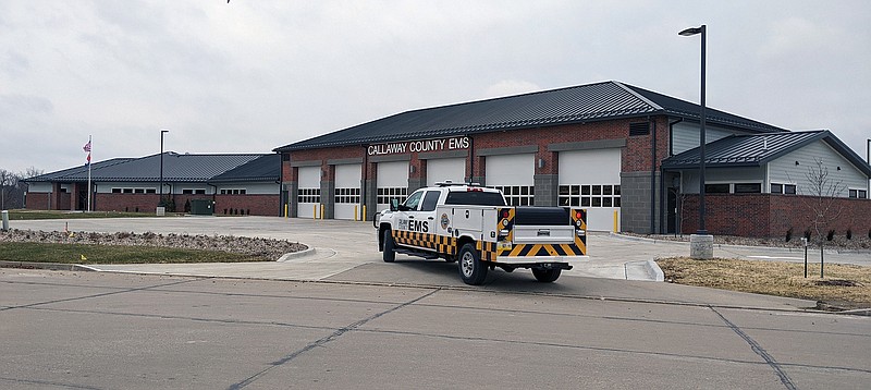 <p>Helen Wilbers/For the News Tribune </p><p>A Callaway EMS vehicle pulls into the new ambulance district headquarters near Tanglewood. The facility has six ambulance bays and ample storage room.</p>