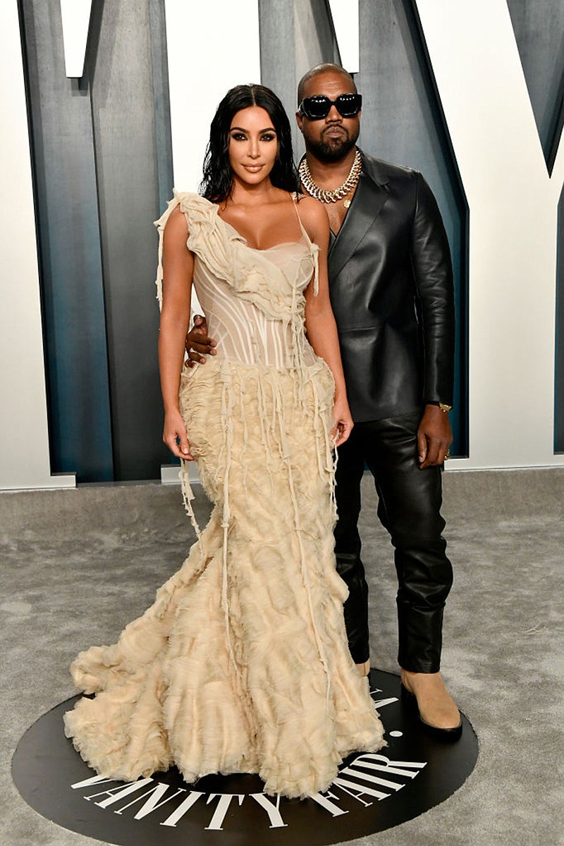 From left to right: Kim Kardashian and Kanye West attend the 2020 Vanity Fair Oscar Party hosted by Radhika Jones at Wallis Annenberg Center for the Performing Arts on February 9, 2020 in Beverly Hills, California. (Photo by Frazer Harrison/Getty Images/TNS)