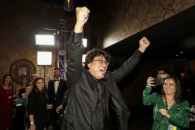 "Parasite" director Bong Joon Ho cheers his cast's landmark win, marking the first time in history that a foreign-language film has won the SAG Award for best ensemble. (Al Seib/Los Angeles Times/TNS)