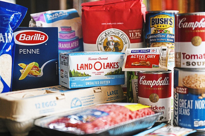 Meat, yeast, flour, sugar, frozen vegetables,  canned and dry beans, and other pantry staples were often in short supply during the early days of the pandemic. (Steve Mellon/Pittsburgh Post-Gazette/TNS)