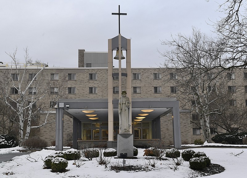 Exterior view of the St. Joseph's Provincial House, Tuesday, Jan. 5, 2021, in Latham, N.Y.  The home for retired and infirm nuns lost nine residents to COVID-19 during December as the coronavirus pandemic's second wave surged in upstate New York. (AP Photo/Hans Pennink)