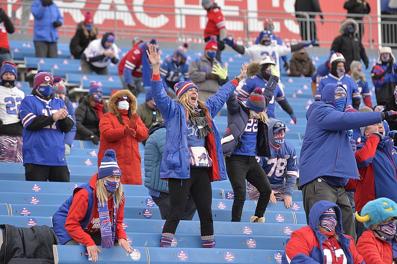 Bills fans react during the second half of Saturday's wild-card game against the Colts in Orchard Park, N.Y. The Bills won the game 27-24. 
