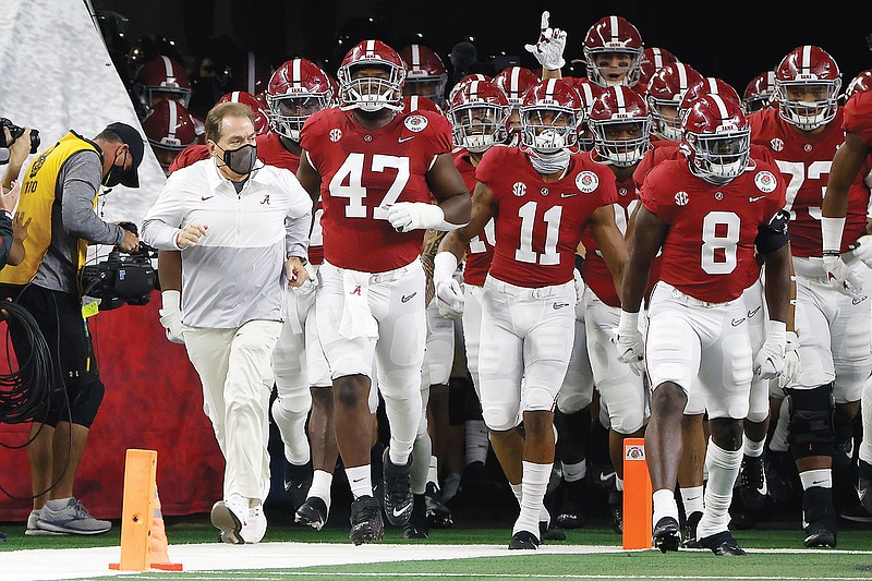 Alabama coach Nick Saban jogs onto the field with his team prior to the Rose Bowl against Notre Dame earlier this month in Arlington, Texas.