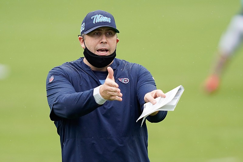 FILE - Tennessee Titans offensive coordinator Arthur Smith instructs his players during NFL football training camp in Nashville, Tenn., in this Friday, Aug. 21, 2020, file photo. The New York Jets interviewed Tennessee Titans offensive coordinator Arthur Smith on Monday, Jan. 11, 2021, for their head coaching vacancy. (AP Photo/Mark Humphrey, Pool, File)