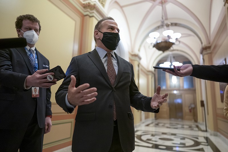 Rep. David Cicilline, D-R.I., talks to reporters just outside the House chamber after a resolution calling for the removal of President Donald Trump from office was blocked by Republicans, at the Capitol in Washington, Monday, Jan. 11, 2021. House Speaker Nancy Pelosi, D-Calif., is calling for congressional action to rein in President Donald Trump after inciting last week's deadly assault on the U.S. Capitol. (AP Photo/J. Scott Applewhite)