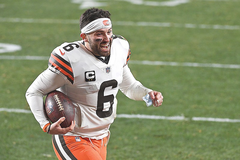 Browns quarterback Baker Mayfield reacts as he runs off the field after defeating the Steelers 48-37 in Sunday's NFL wild-card playoff game in Pittsburgh.