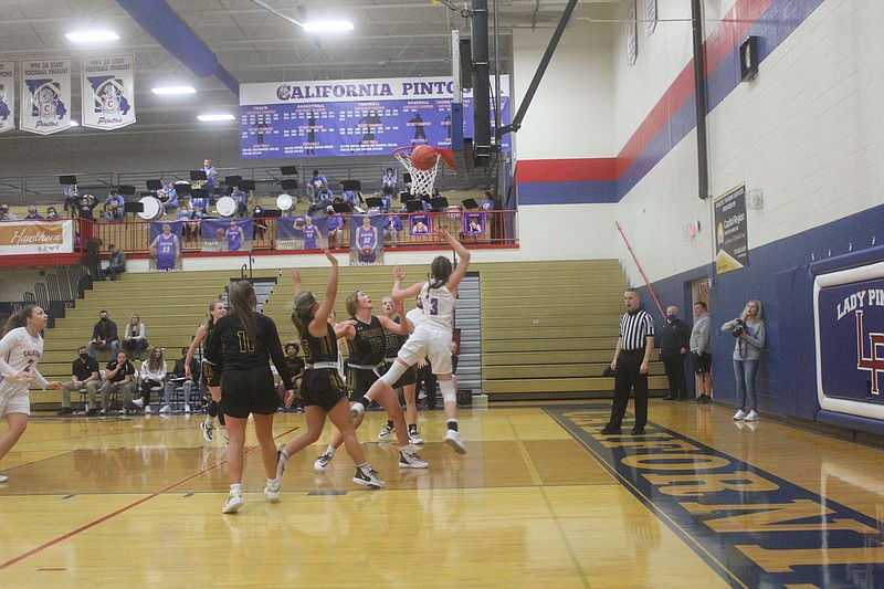 <p>Democrat photo/Kevin Labotka</p><p>Tristan Porter scores on a layup Jan. 11 during the Pintos’ 69-37 win over the Fulton Hornets in the first round of the California girls basketball tournament. Porter led all scorers with 30 points in the game.</p>