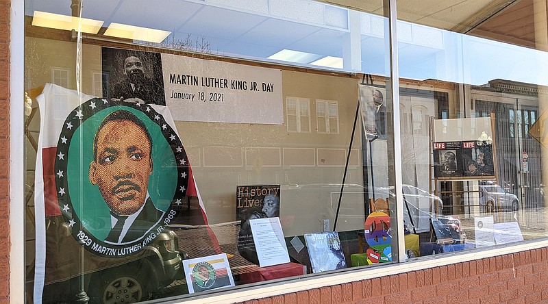 Helen Wilbers/FULTON SUN A display in downtown Fulton commemorates the life and accomplishments of Martin Luther King, Jr. Martin Luther King, Jr. Day is Monday, and many local government offices will be closed in honor of the day. 'I want to remind people of his legacy in these times,' said Carmen Brandt of the Fulton NAACP and Human Rights Commission, who designed the display. 'He believed in nonviolence.'

She noted that the Callaway County Public Library has many books about the Civil Rights Movement and MLK's life. 'He was one of those people with character and integrity, making the world a better place,' she said.