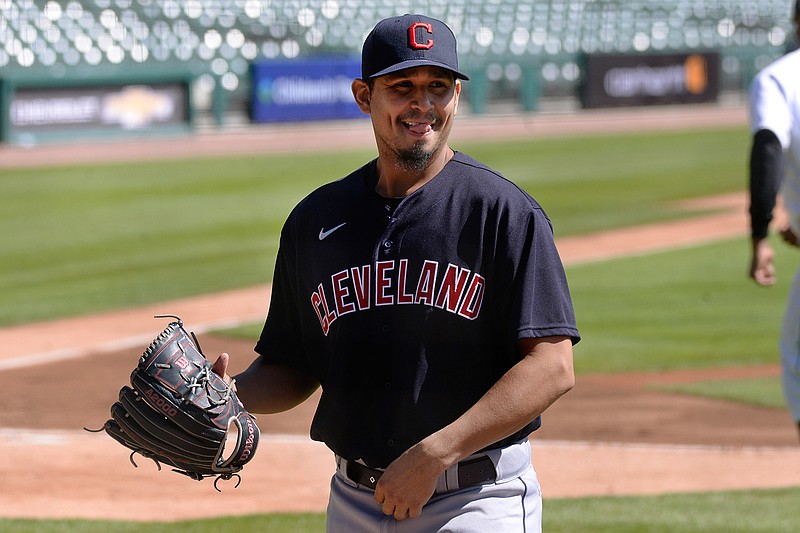 Cleveland Indians starting pitcher Carlos Carrasco walks to the dugout after striking out Detroit Tigers' Miguel Cabrera in the first inning of a baseball game in Detroit, in this Sunday, Sept. 20, 2020, file photo. The Cleveland Indians have agreed to trade four-time All-Star shortstop Francisco Lindor and pitcher Carlos Carrasco to the New York Mets, a person with direct knowledge of the deal told the Associated Press on Thursday, Jan. 7, 2021. (AP Photo/Jose Juarez, File)