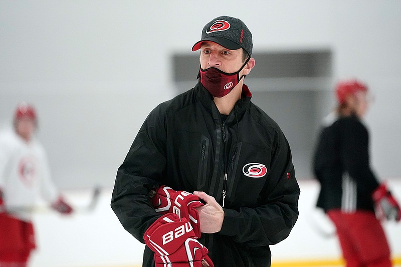 Carolina Hurricanes coach Rod Brind'Amour conducts drills during NHL hockey training camp in Morrisville, N.C., Wednesday, Jan. 6, 2021. (AP Photo/Gerry Broome)