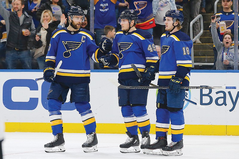 In this Feb. 18, 2020, file photo, Alex Pietrangelo (left) congratulates Blues teammate Ivan Barbashev after he scored a goal during a game against the Devils in St. Louis.