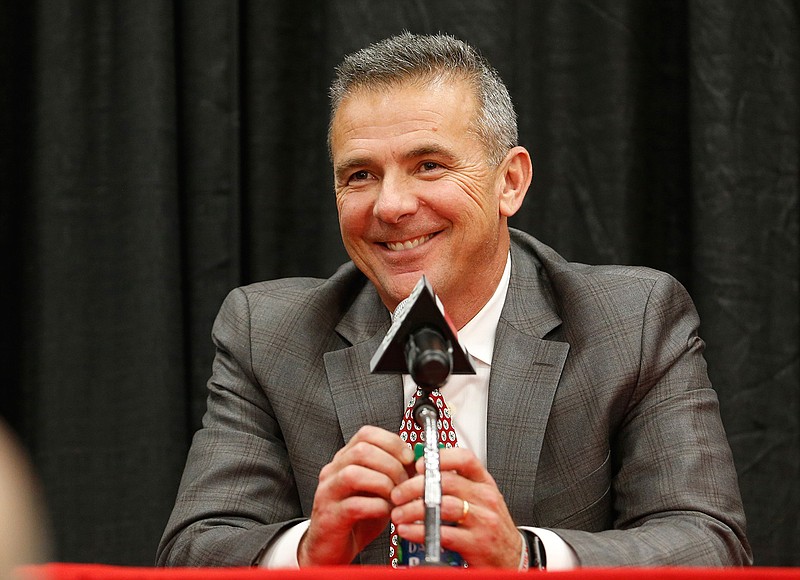 Ohio State NCAA college football head coach Urban Meyer answers questions during a news conference announcing his retirement in Columbus, Ohio, in this Tuesday, Dec. 4, 2018, file photo. A person familiar with the search says Urban Meyer and the Jacksonville Jaguars are working toward finalizing a deal to make him the team's next head coach. The person spoke to The Associated Press on the condition of anonymity Thursday, Jan. 14, 2021, because a formal agreement was not yet in place. (AP Photo/Jay LaPrete, File)