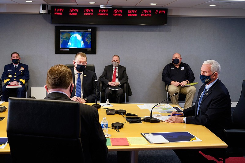 Vice President Mike Pence listens during a briefing about the upcoming presidential inauguration of President-elect Joe Biden and Vice President-elect Kamala Harris, at FEMA headquarters, Thursday, Jan. 14, 2021, in Washington. (AP Photo/Alex Brandon, Pool)