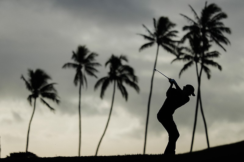 Adam Scott, of Australia, hits from the 11th tee box during the first round of the Sony Open golf tournament Thursday, Jan. 14, 2021, at Waialae Country Club in Honolulu. (AP Photo/Jamm Aquino)