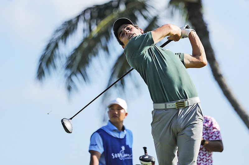 Joaquin Niemann follows through on his shot from the 14th tee box during Thursday's first round of the Sony Open at Waialae Country Club in Honolulu.