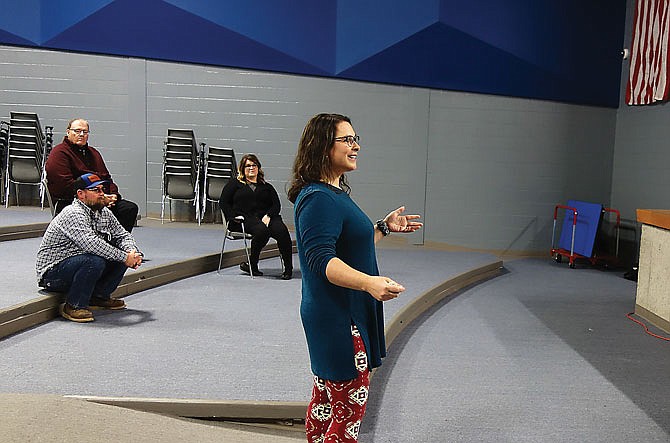 Jeannie Sneller, sixth- and seventh-grade science teacher at South Callaway Middle School, talks Wednesday about the "Linking Science and Literacy for All Learners" initiative during a South Callaway Board of Education meeting.