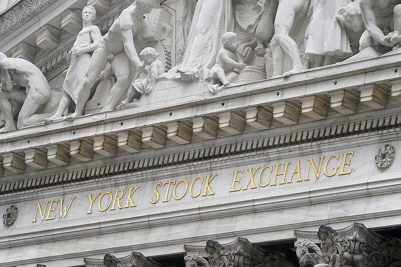 FILE - In this Nov. 23, 2020 file photo, stone sculptures adorn the New York Stock Exchange.  Stocks are pulling lower again on Friday, Jan. 15, 2021,  after reports showed the pandemic is deepening the hole for the economy, as Washington prepares to throw it another lifeline.   (AP Photo/Seth Wenig, File)