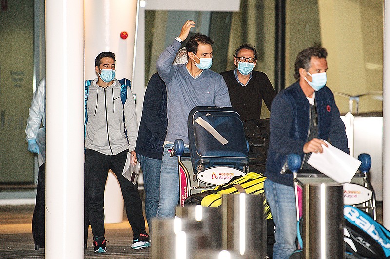 Rafael Nadal (center) arrives Thursday at Adelaide Airport ahead of the Australian Open in Adelaide, Australia.