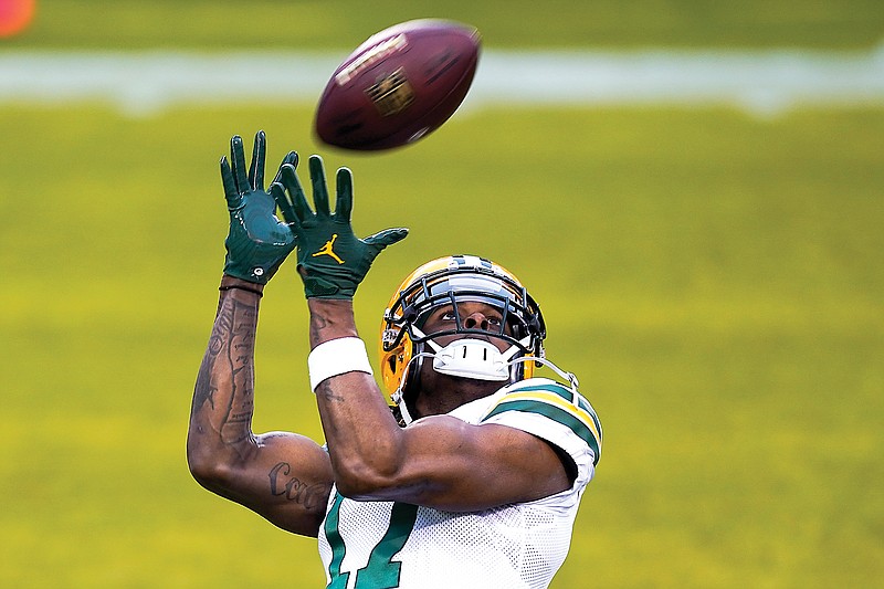 Packers wide receiver Davante Adams warms up before a game earlier this month against the Bears in Chicago.