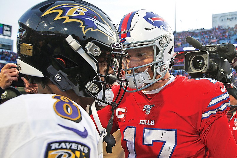 In this Dec. 8, 2019, file photo, Bills quarterback Josh Allen (right) talks with Ravens quarterback Lamar Jackson following a 24-17 Ravens win in a game in Orchard Park, N.Y.