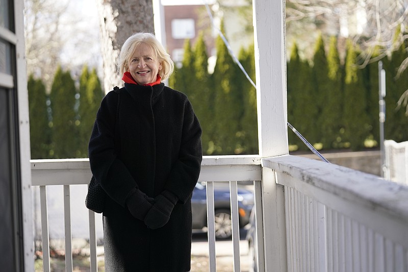 CEO of the Housing Development Fund, Joan Carty, poses for a portrait Tuesday, Dec. 29, 2020, in Stamford, Conn.  With many New Yorkers moving to neighboring Connecticut during the pandemic, especially Fairfield County, it's becoming more challenging for people to find affordable homes to buy.  Carty said the region's housing affordability issue is exacerbated by the influx. (AP Photo/Frank Franklin II)