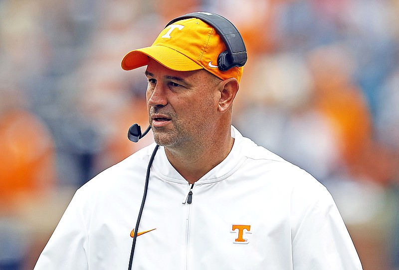 In this Oct. 12, 2019, file photo, Tennessee coach Jeremy Pruitt watches during the second half of a game against Mississippi State in Knoxville, Tenn. Tennessee fired Pruitt Monday.