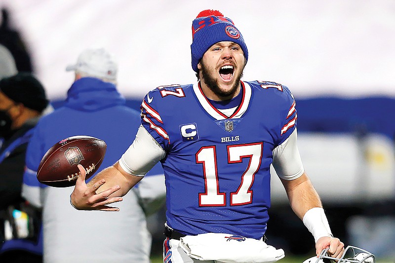 Bills quarterback Josh Allen celebrates after Saturday's AFC divisional round game against the Ravens in Orchard Park, N.Y. The Bills won 17-3.