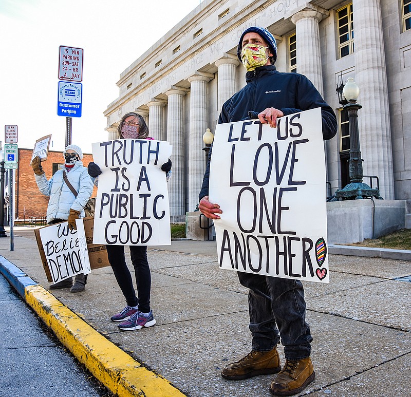 Members of the Mid-Missouri Fellowship of Reconciliation gathered in front of the U.S. Post Office on High Street in Jefferson City on Wednesday, Jan. 20, 2021, with the idea of showing that "it is imperative that people of conscience,  particularly those of unearned white privilege, take a nonviolent stand affirming core principles for a civilized society."