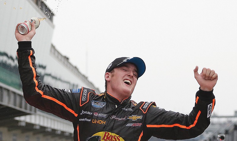 In this July 26, 2014, file photo, Ty Dillon celebrates after winning the NASCAR Nationwide Series race at Indianapolis Motor Speedway in Indianapolis.