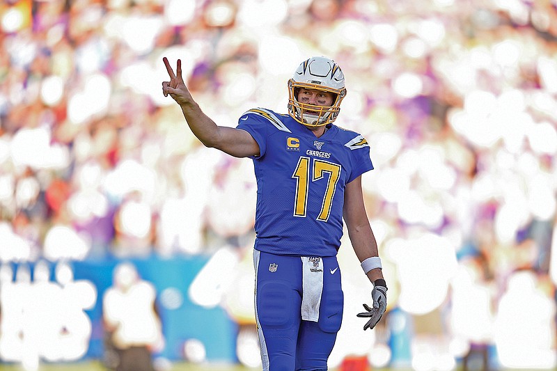 In this Dec. 15, 2019, file photo, Chargers quarterback Philip Rivers gestures during a game against the Vikings in Carson, Calif. Rivers, who announced his retirement Wednesday, spent 16 of his 17 season with the Chargers. 