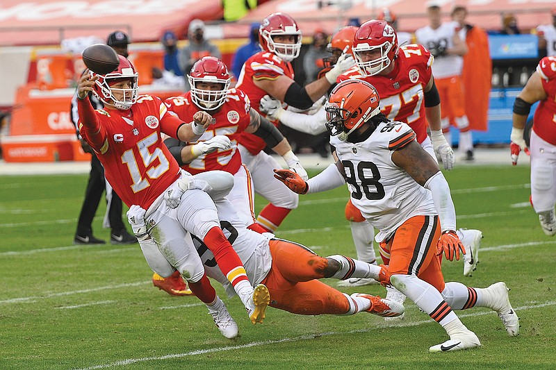 Chiefs quarterback Patrick Mahomes throws a pass under pressure from Browns defensive tackle Sheldon Richardson during the second half of last Sunday's game at Arrowhead Stadium.