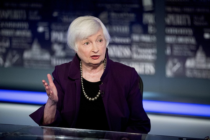 FILE - In this Aug. 14, 2019, file photo former Fed Chair Janet Yellen speaks with FOX Business Network guest anchor Jon Hilsenrath in the Fox Washington bureau in Washington. The Senate Finance Committee has approved President Joe Biden’s nomination of Janet Yellen to be the nation’s 78th Treasury secretary (AP Photo/Andrew Harnik, File)