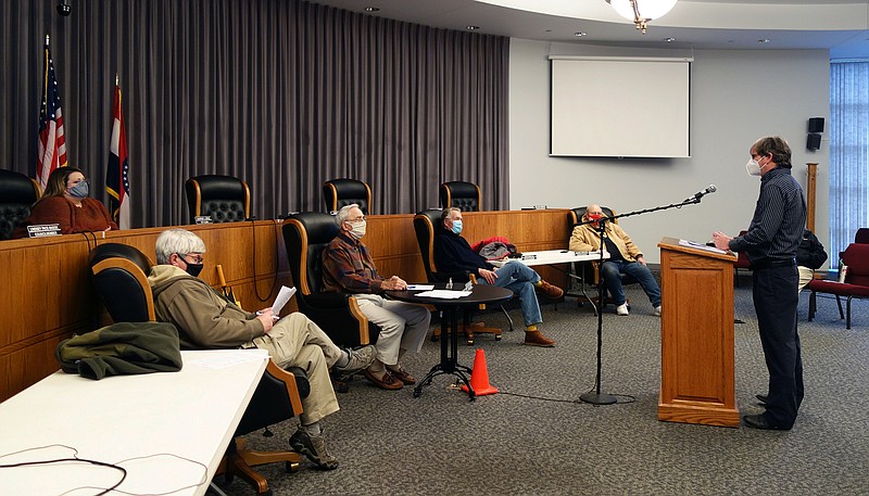 Fulton utilities superintendent Darrell Dunlap addresses city officials and members of the Fulton Public Utility Board during Monday's meeting.