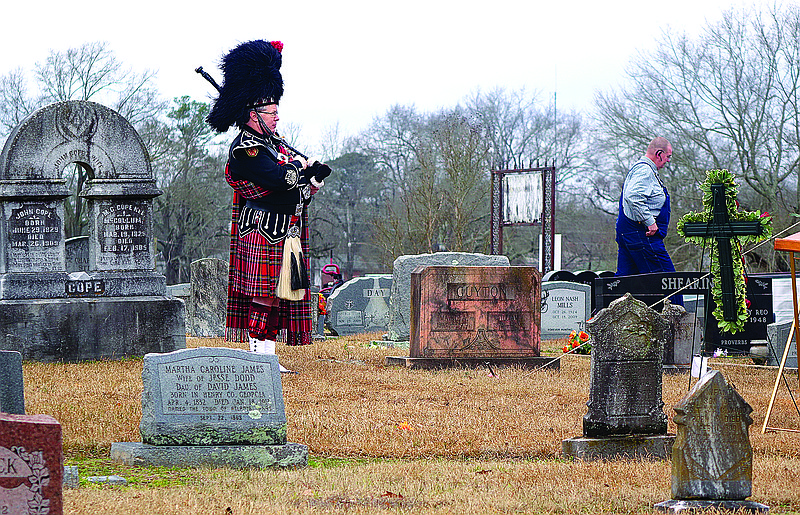 Dr. George English of Texarkana was dressed in the full regalia of a Scottish bagpiper as he opened and closed the funeral service for volunteer fire department member Danny Joe Hurt.