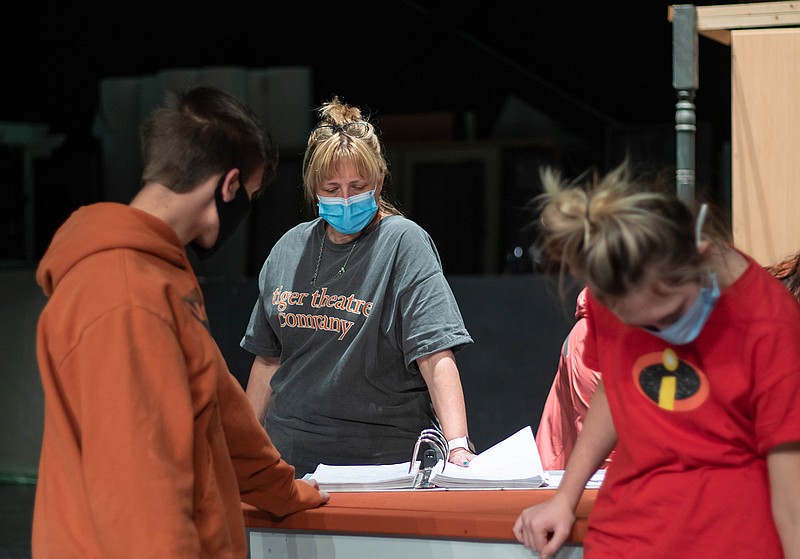 Director Melissa Newton works with Jeremy Creek and Anabeth Icehower on Texas High School Tiger Theatre's production of the musical "Bright Star."