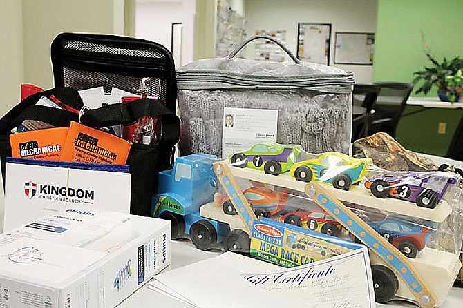 Giveaway items piled up in the Callaway Chamber of Commerce offices before the 2020 Lovin' Local event. The popular giveaway is returning starting Monday.