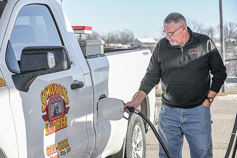 JD Drinkard fills up the Scruggs Lumber company truck Thursday at Jefferson Street Conoco. Gov. Mike Parson has floated the idea of a gas or use tax to fund Missouri's highways and bridges.