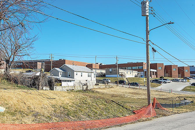 Jefferson City High School is seen in the background from this address on Union Street, which is where the district plans to build athletic facilities. 