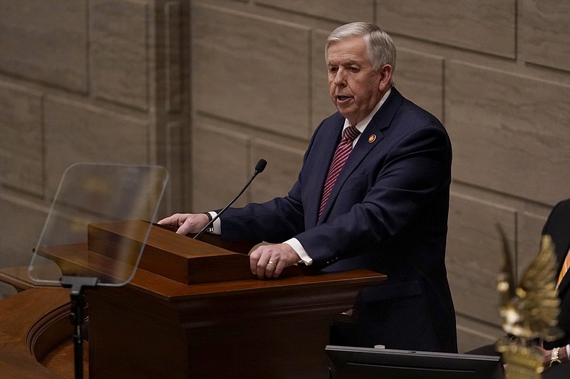 Missouri Gov. Mike Parson delivers the State of the State address Wednesday, Jan. 27, 2021, in Jefferson City, Mo. The speech is traditionally given in the House chamber but was moved to the smaller Senate chamber at the last minute due to concerns about the coronavirus. (AP Photo/Jeff Roberson)