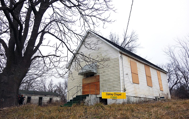 Oakley Chapel African Methodist Episcopal Church, which stands on County Road 485 in Tebbetts, is boarded up following serious damage by vandals. Five teenagers have been arrested in connection with the case.