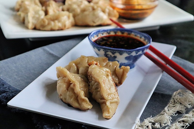 Easy, yummy and fun to eat Pork pot stickers with soygarlic dipping