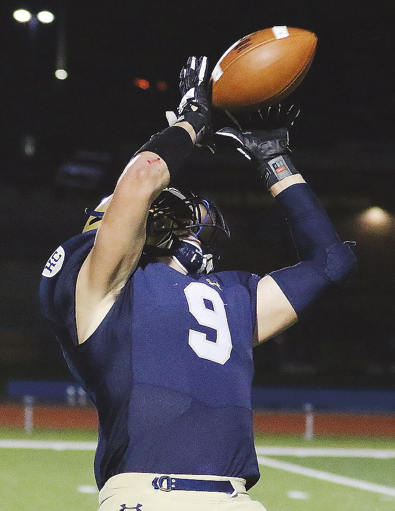 Helias tight end Damon Johanns makes a catch during a game last season against Borgia at Ray Hentges Stadium.
