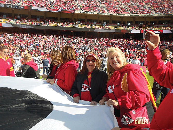 Ann Kampeter and Leah Ann Hilgert, both of Holts Summit, will be at the Super Bowl on Sunday to cheer for the Kansas City Chiefs. As shown in this photo from 2012, the season ticket-holders got to walk the arrowhead out onto the field during pre-game ceremonies at Arrowhead Stadium.