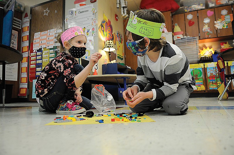 Callaway Hills Elementary School kindergartners in Ann Clervi's class celebrated the 100th day of school Wednesday by practicing counting to 100. Students brought in their collections of 100 things, such as pennies, Fruit Loops, cotton swabs, buttons and Legos. They also played games and listened to stories about counting to 100.