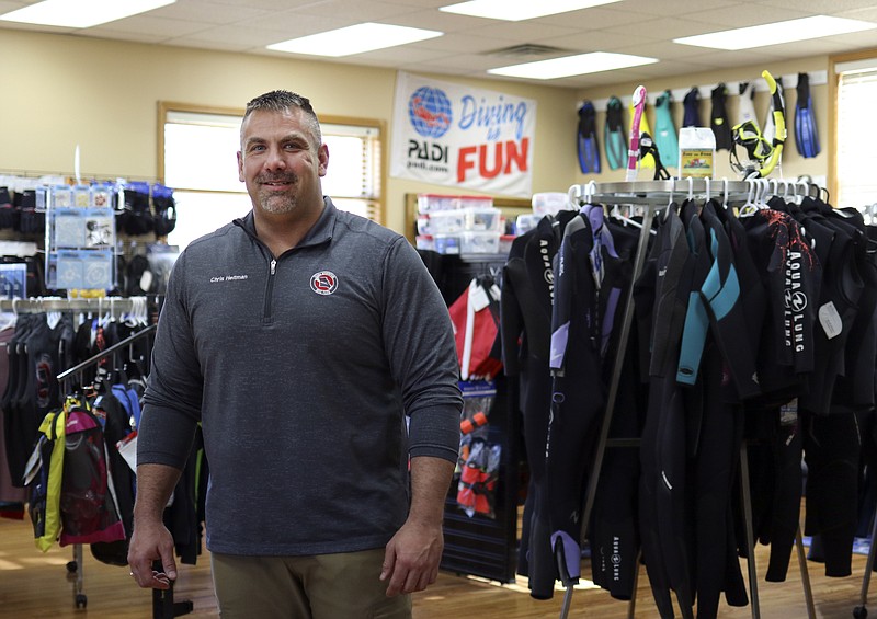 Liv Paggiarino/News Tribune

Chris Heitman stands in the new space for Scuba Adventure on Wednesday along McCarty Street. 