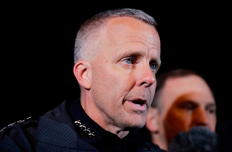 In this March 21, 2018 file photo, Austin Police Chief Brian Manley briefs the media in the Austin suburb of Round Rock, Texas.  Austin officials said Friday, Feb. 12, 2021, that Manley is stepping down after leading the police force since May of 2018. (AP Photo/Eric Gay, File)
