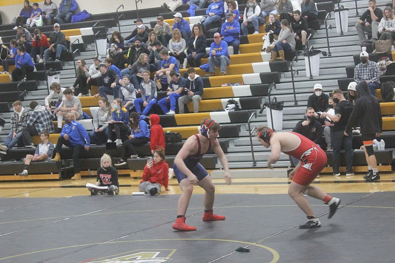 <p>Democrat photo/Kevin Labotka</p><p>The California Pintos wrestling team competed Feb. 13 at districts at Versailles. Three Pintos are moving on to sectionals following placements at districts.</p>