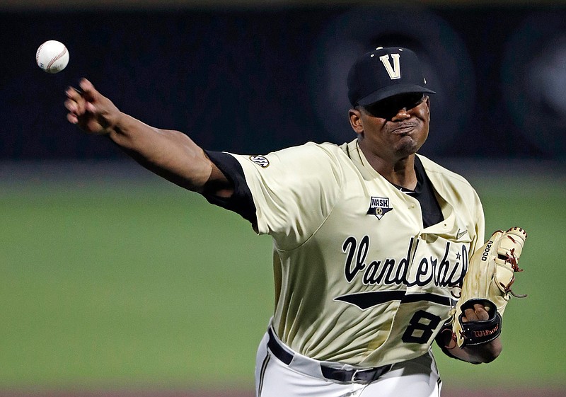 Vanderbilt's Kumar Rocker throws to a Duke batter during the eighth inning of an NCAA college baseball tournament super regional game in Nashville, Tenn., in this Saturday, June 8, 2019, file photo. Rocker threw a no-hitter in Vanderbilt's 3-0 victory. Vanderbilt returns most of its everyday lineup, features the top two pitchers in college baseball and won the most recent national championship. (AP Photo/Wade Payne, File)
