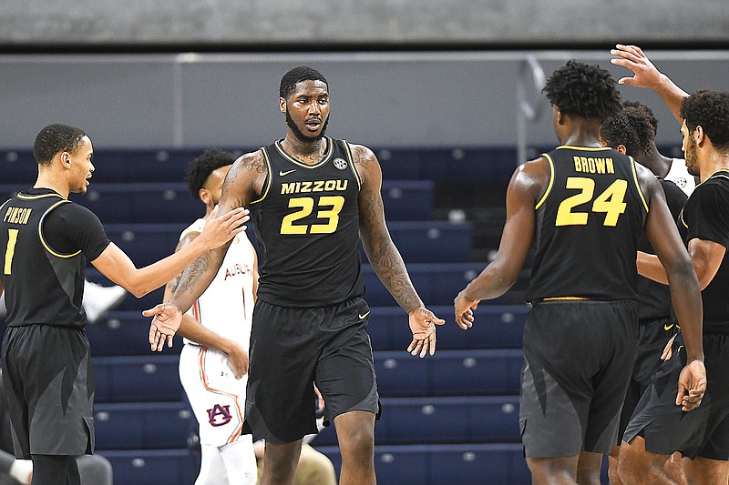 In this Jan. 26 file photo, Missouri forward Jeremiah Tilmon celebrates a score with his teammates during the first half of a game against Auburn in Auburn, Ala.